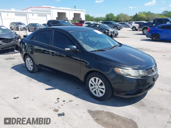 2010 Kia Forte EX with VIN KNAFU4A20A5847351, listed as a IAAI auction lot 41897921 with 129,084 mi miles. Bid and sale history available at carsss.com. Image 1.