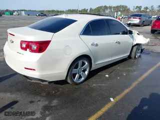 2014 Chevrolet Malibu LTZ with VIN 1G11J5SXXEF114531, listed as a IAAI auction lot 41409618 with 153,040 mi miles. Bid and sale history available at carsss.com. Image 4.