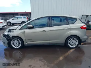 2015 Ford C-Max Hybrid SE with VIN 1FADP5AU5FL120692, listed as a IAAI auction lot 41590616 with 102,381 mi miles. Bid and sale history available at carsss.com. Image 14.