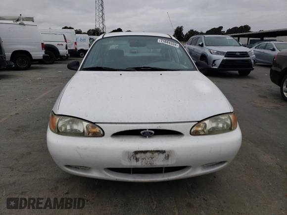 1999 Ford Escort LX z VIN 1FAFP10P7XW221648, wystawiony jako Copart lot #71844334 z przebiegiem 140 899 mil mil oraz Szkody całkowita. Historia ofert i sprzedaży dostępna na DreamBid. Obrazek 5.
