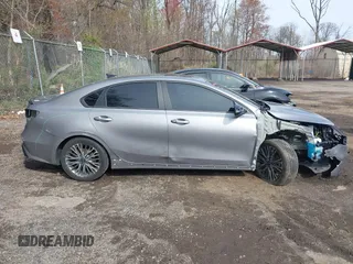 2023 Kia Forte GT-Line z VIN 3KPF54AD6PE684798, wystawiony jako IAAI lot #41921089 z przebiegiem 24 670 mil mil oraz . Historia ofert i sprzedaży dostępna na DreamBid. Obrazek 13.