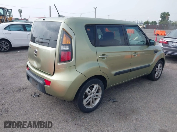 2011 Kia Soul + with VIN KNDJT2A2XB7205827, listed as a IAAI auction lot 41889620 with 158,965 mi miles. Bid and sale history available at carsss.com. Image 4.