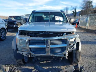 2007 Dodge Nitro SXT with VIN 1D8GU28K67W740794, listed as a IAAI auction lot 41591855 with 162,709 mi miles. Bid and sale history available at carsss.com. Image 13.