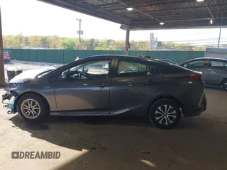 2021 Toyota Prius LE with VIN JTDKAMFP2M3168342, listed as a IAAI auction lot 42132946 with 69,628 mi miles and . Bid and sale history available at DreamBid. Image 15.