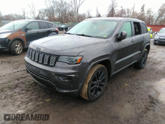 2020 Jeep Grand Cherokee Altitude with VIN 1C4RJFAGXLC211518, listed as a IAAI auction lot 41668994 with 130,371 mi miles. Bid and sale history available at carsss.com. Image 2.