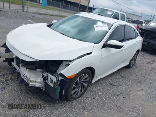 2018 Honda Civic LX with VIN 2HGFC2F59JH576975, listed as a IAAI auction lot 42098020 with 89,791 mi miles and . Bid and sale history available at DreamBid. Image 18.