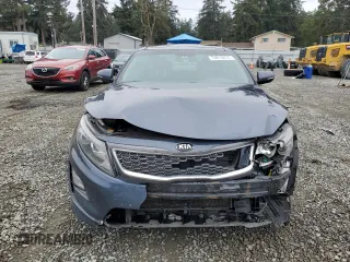 2014 Kia Optima Hybrid EX with VIN KNAGN4AD0E5063891, listed as a Copart auction lot 74816874 with 86,743 mi miles and Salvage Title. Bid and sale history available at carsss.com. Image 5.