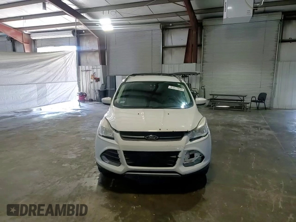 2013 Ford Escape SE z VIN 1FMCU9G93DUA69673, wystawiony jako Copart lot #61017055 z przebiegiem 204 095 mil mil oraz Czysty tytuł • Clean title. Historia ofert i sprzedaży dostępna na DreamBid. Obrazek 14.