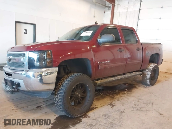 2013 Chevrolet Silverado 1500 LT with VIN 3GCPKSE77DG254204, listed as a IAAI auction lot 41680546 with 213,790 mi miles. Bid and sale history available at carsss.com. Image 2.
