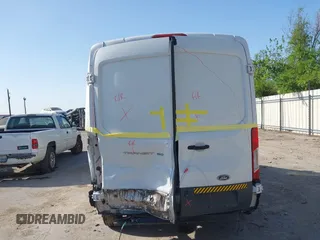 2017 Ford Transit Cargo with VIN 1FTYE1CM4HKB25432, listed as a IAAI auction lot 41830840 with 184,829 mi miles and . Bid and sale history available at carsss.com. Image 16.