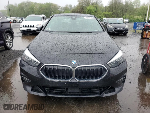 2021 BMW 2 Series 228i xDrive with VIN WBA73AK07M7H58410, listed as a Copart auction lot 55775995 with 76,921 mi miles and Salvage title. Bid and sale history available at DreamBid. Image 5.