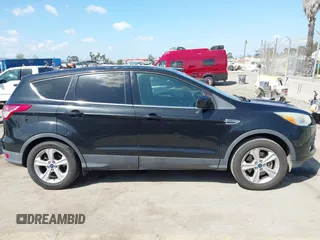 2015 Ford Escape SE with VIN 1FMCU0G91FUA18588, listed as a IAAI auction lot 41958047 with 111,523 mi miles. Bid and sale history available at carsss.com. Image 13.