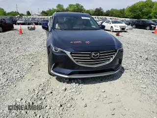 2016 Mazda CX-9 Grand Touring with VIN JM3TCBDY0G0116686, listed as a Copart auction lot 54077335 with 142,670 mi miles and Salvage title. Bid and sale history available at DreamBid. Image 14.