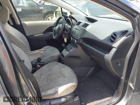 2012 Mazda 5 Sport with VIN JM1CW2BL8C0131745, listed as a IAAI auction lot 42625411 with 194,875 mi miles and . Bid and sale history available at DreamBid. Image 5.