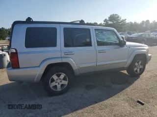2010 Jeep Commander Sport with VIN 1J4RG4GK4AC125711, listed as a Copart auction lot 60369545 with 209,522 mi miles and Clean title. Bid and sale history available at DreamBid. Image 3.