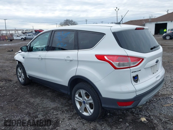 2014 Ford Escape SE z VIN 1FMCU9GX6EUE32418, wystawiony jako IAAI lot #42022304 z przebiegiem 100 216 mil mil oraz . Historia ofert i sprzedaży dostępna na DreamBid. Obrazek 3.