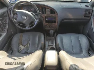 2004 Hyundai Elantra GLS z VIN KMHDN46D94U917890, wystawiony jako Copart lot #60000025 z przebiegiem 158 474 mil mil oraz Czysty tytuł • Clean title. Historia ofert i sprzedaży dostępna na DreamBid. Obrazek 8.