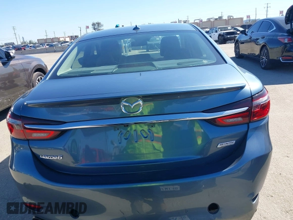 2018 Mazda 6 Grand Touring with VIN JM1GL1TY4J1333021, listed as a IAAI auction lot 41818719 with 56,188 mi miles and . Bid and sale history available at DreamBid. Image 16.
