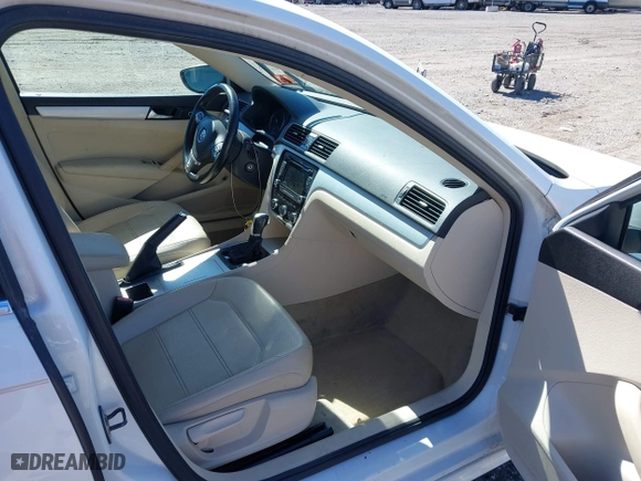 2012 Volkswagen Passat SE with VIN 1VWBP7A38CC030837, listed as a IAAI auction lot 41864669 with 169,816 mi miles. Bid and sale history available at carsss.com. Image 5.
