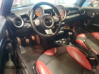 2010 MINI Convertible S with VIN WMWMS3C50ATY51636, listed as a Copart auction lot 66097715 with 103,525 mi miles and Salvage title. Bid and sale history available at DreamBid. Image 8.