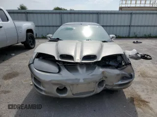 2001 Pontiac Firebird Formula z VIN 2G2FV22G912123611, wystawiony jako Copart lot #56820064 z przebiegiem 55 319 mil mil oraz Szkody całkowita. Historia ofert i sprzedaży dostępna na DreamBid. Obrazek 5.