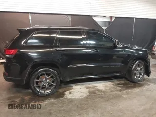 2019 Jeep Grand Cherokee Limited with VIN 1C4RJFBG8KC702053, listed as a IAAI auction lot 41854929 with 50,990 mi miles and . Bid and sale history available at DreamBid. Image 14.