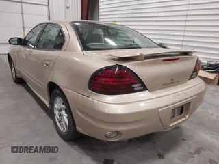2003 Pontiac Grand Am SE1 with VIN 1G2NF52EX3C104710, listed as a IAAI auction lot 42053621 with 102,012 mi miles. Bid and sale history available at carsss.com. Image 3.