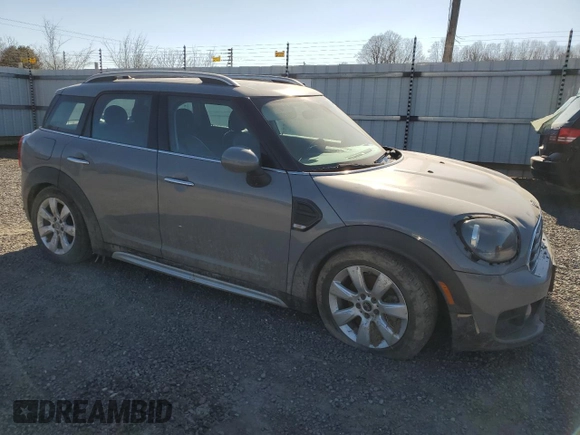 2019 MINI Countryman Cooper with VIN WMZYV5C57K3F57419, listed as a Copart auction lot 38755424 with 84,581 mi miles and Salvage Title. Bid and sale history available at carsss.com. Image 4.