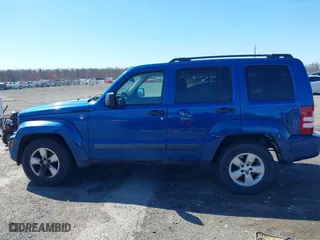 2009 Jeep Liberty Sport with VIN 1J8GN28K69W533457, listed as a IAAI auction lot 41831960 with 185,403 mi miles. Bid and sale history available at carsss.com. Image 14.