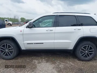 2018 Jeep Grand Cherokee Trailhawk с VIN 1C4RJFLT3JC441618, выставлен на аукционе IAAI как лот 42285621 с пробегом 125 686 миль миль и . История ставок и продаж доступна на DreamBid. Изображение 14.