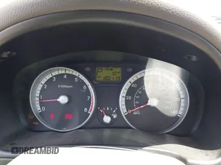 2009 Hyundai Accent Auto GLS z VIN KMHCN46C59U374905, wystawiony jako IAAI lot #42414572 z przebiegiem 180 119 mil mil oraz . Historia ofert i sprzedaży dostępna na DreamBid. Obrazek 7.
