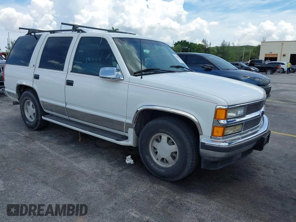 1995 Chevrolet Tahoe with VIN 1GNEC13K9SJ414611, listed as a IAAI auction lot 42798752 with 205,988 mi miles and . Bid and sale history available at DreamBid. Image 1.
