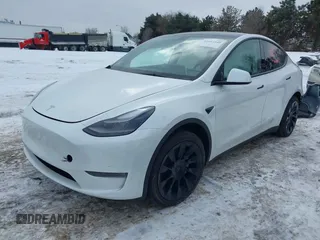 2023 Tesla Model Y Long Range with VIN 7SAYGAEE8PF706706, listed as a IAAI auction lot 41297340 with 24,428 mi miles and . Bid and sale history available at DreamBid. Image 2.