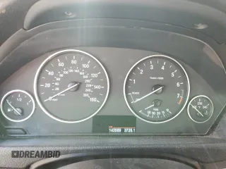 2013 BMW 3 Series 328i xDrive with VIN WBA3B3C5XDJ810958, listed as a Copart auction lot 60620005 with 143,589 mi miles and Salvage title. Bid and sale history available at DreamBid. Image 9.