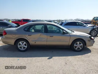 2002 Ford Taurus SES Standard with VIN 1FAFP55U52A156214, listed as a IAAI auction lot 41803668 with 31,693 mi miles. Bid and sale history available at carsss.com. Image 13.