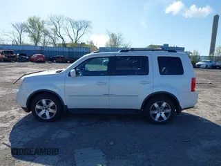 2012 Honda Pilot Touring with VIN 5FNYF4H98CB057659, listed as a IAAI auction lot 41927990 with 140,000 mi miles. Bid and sale history available at carsss.com. Image 14.