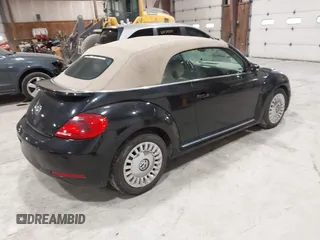 2014 Volkswagen Beetle 1.8T с VIN 3VW517AT5EM818796, выставлен на аукционе IAAI как лот 42318653 с пробегом 150 443 миль миль и . История ставок и продаж доступна на DreamBid. Изображение 4.