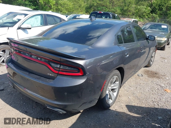 2018 Dodge Charger SXT Plus with VIN 2C3CDXHG9JH176400, listed as a IAAI auction lot 42128281 with 198,766 mi miles and . Bid and sale history available at carsss.com. Image 4.