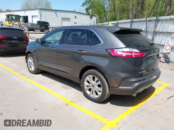 2020 Ford Edge Titanium with VIN 2FMPK4K96LBA56972, listed as a IAAI auction lot 42246224 with 109,463 mi miles and . Bid and sale history available at DreamBid. Image 3.