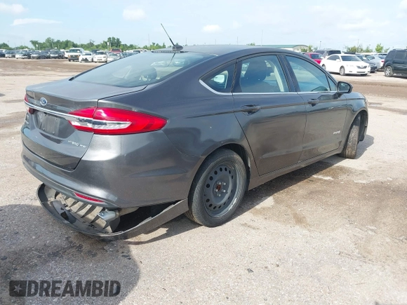 2017 Ford Fusion Hybrid SE with VIN 3FA6P0LU5HR336779, listed as a IAAI auction lot 42691789 with 140,720 mi miles and . Bid and sale history available at DreamBid. Image 4.