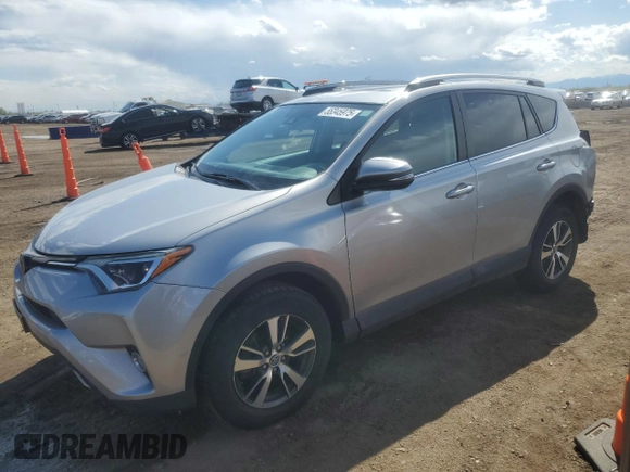 2018 Toyota RAV4 XLE with VIN 2T3RFREV2JW699448, listed as a Copart auction lot 55345975 with 46,437 mi miles and Salvage Title. Bid and sale history available at DreamBid. Image 1.