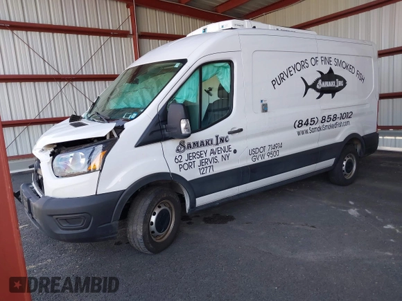 2021 Ford Transit Cargo with VIN 1FTBR1C86MKA10399, listed as a IAAI auction lot 42074285 with 55,572 mi miles and . Bid and sale history available at DreamBid. Image 2.