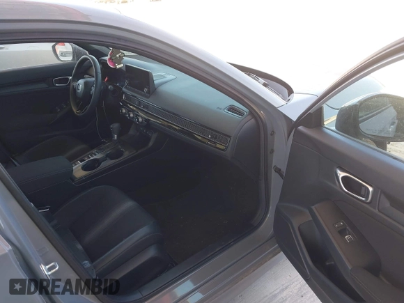 2025 Honda Civic Sport with VIN 2HGFE2F54SH542602, listed as a IAAI auction lot 42068927 with 7,110 mi miles and . Bid and sale history available at DreamBid. Image 5.