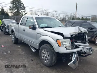 2014 Ford F-150 XL with VIN 1FTFX1ET3EFC39285, listed as a IAAI auction lot 41390024 with 217,856 mi miles. Bid and sale history available at carsss.com. Image 1.