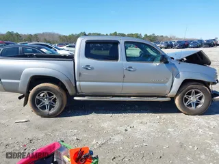 2014 Toyota Tacoma PreRunner with VIN 5TFJU4GNXEX061808, listed as a IAAI auction lot 41585931 with 214,240 mi miles. Bid and sale history available at carsss.com. Image 13.