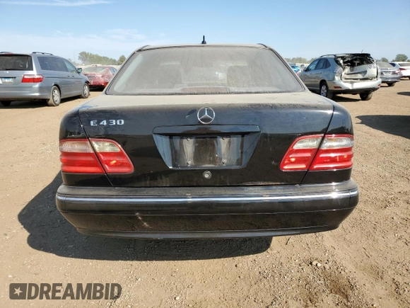 2002 Mercedes-Benz E-Class with VIN WDBJF70J22B489706, listed as a Copart auction lot 71109874 with 59,167 mi miles and Salvage Title. Bid and sale history available at carsss.com. Image 6.