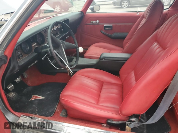 1981 Pontiac Firebird z VIN 1G2AS87A4BN117926, wystawiony jako Copart lot #63220014 z przebiegiem 54 759 mil mil oraz Czysty tytuł • Clean title. Historia ofert i sprzedaży dostępna na DreamBid. Obrazek 7.
