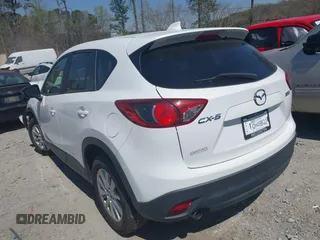 2013 Mazda CX-5 Touring with VIN JM3KE2CE0D0119032, listed as a IAAI auction lot 41891556 with 174,745 mi miles and . Bid and sale history available at carsss.com. Image 3.