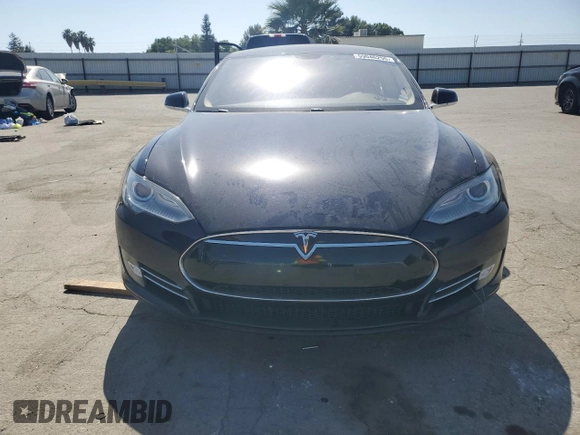 2014 Tesla Model S 60 с VIN 5YJSA1S13EFP29202, выставлен на аукционе Copart как лот 59046255 с пробегом Не указан миль и Списание • Salvage title. История ставок и продаж доступна на DreamBid. Изображение 5.