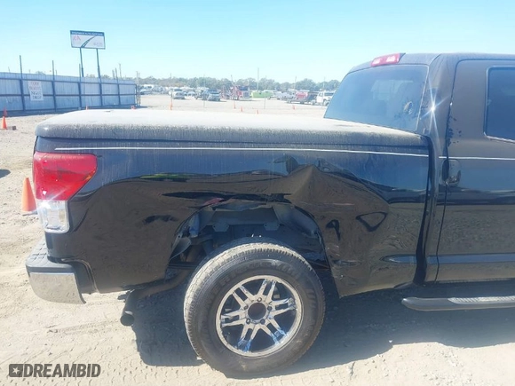 2010 Toyota Tundra 2WD Truck with VIN 5TFRM5F10AX010142, listed as a IAAI auction lot 40586543 with 280,387 mi miles. Bid and sale history available at carsss.com. Image 6.